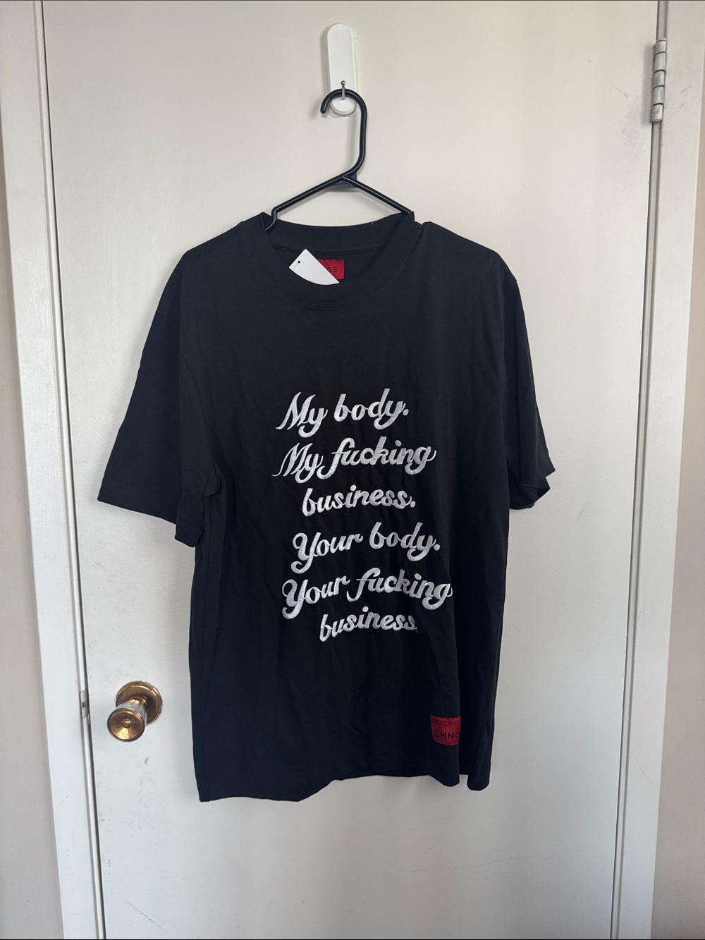 CHNGE Black Graphic Statement Tee with White Script